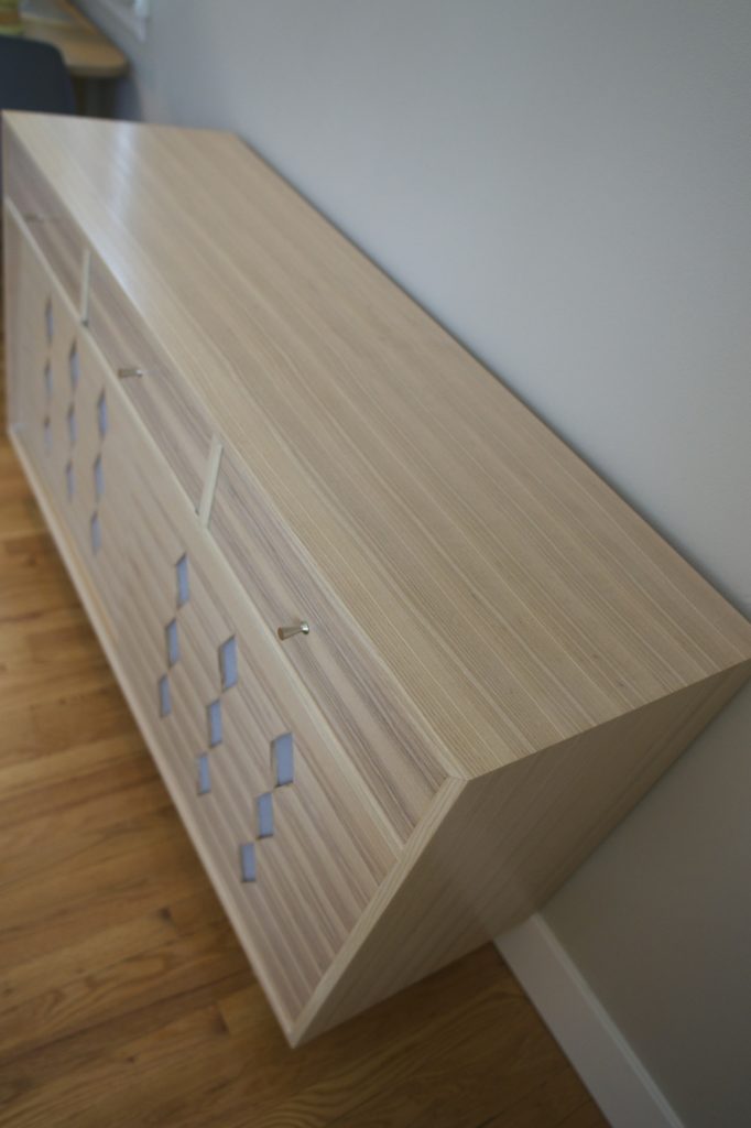 top view of a record console in tight rift sawn ash wood
